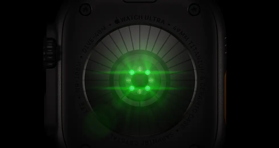 Achterkant van Apple Watch Ultra 4, kast van titanium, kleur zwart, meerdere ronde sensoren met oplichtende groene leds